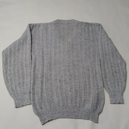 Maglione con scollo a V in maglia grigia