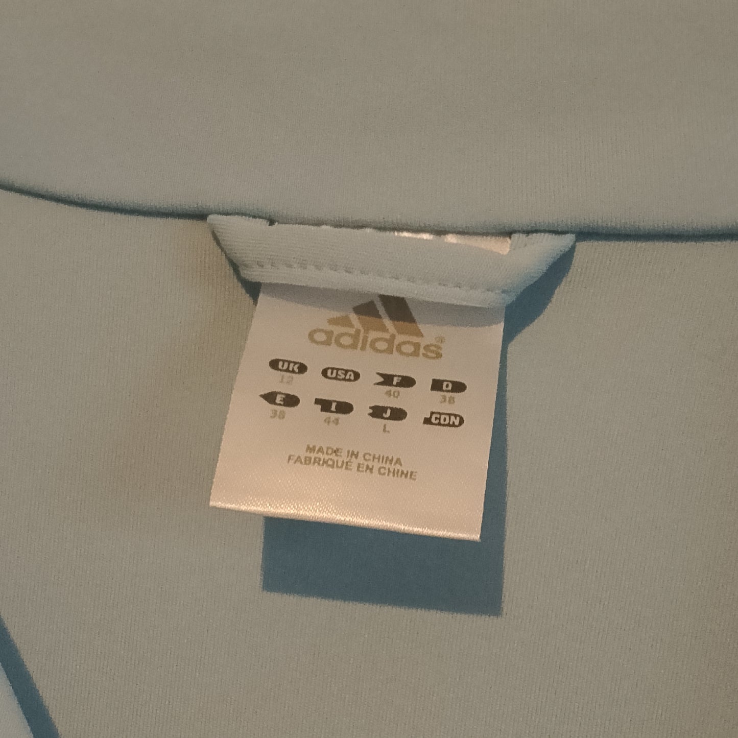 Felpa Adidas azzurra strisce nere