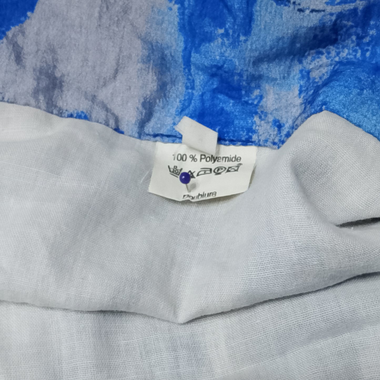 kway con stampa floreale blu e bianca